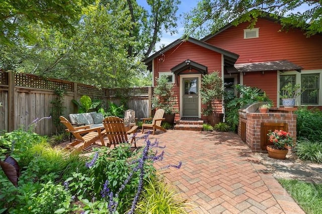 1301 E 48th St, Savannah, GA 31404 - fenced backyard with a patio