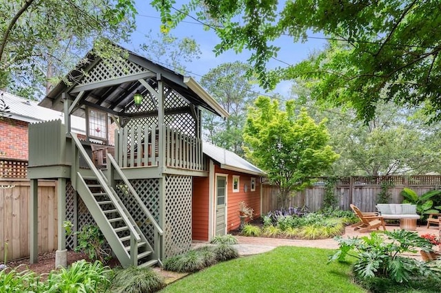 1301 E 48th St, Savannah, GA 31404 - back of property featuring a gazebo, stairway, and a deck