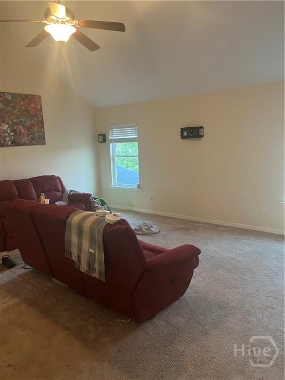 153 Spoonbill Cir, Savannah, GA 31405 - carpeted living area featuring vaulted ceiling, ceiling fan, and baseboards