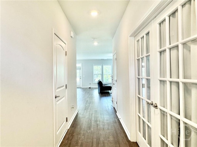 128 Melody Dr, Pooler, GA 31322 - corridor featuring dark wood-style flooring, french doors, and baseboards