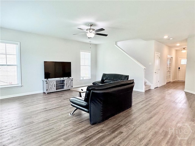 128 Melody Dr, Pooler, GA 31322 - living room with ceiling fan, stairway, wood finished floors, baseboards, and recessed lighting