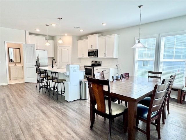 128 Melody Dr, Pooler, GA 31322 - dining area with light wood-style flooring, recessed lighting, and baseboards