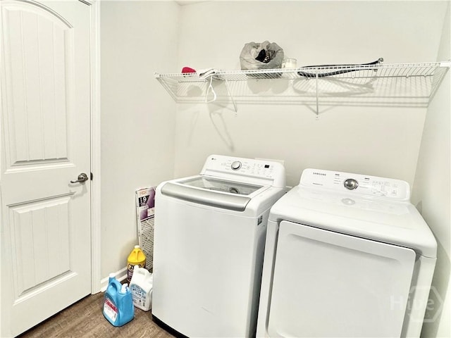 128 Melody Dr, Pooler, GA 31322 - laundry room featuring separate washer and dryer and wood finished floors