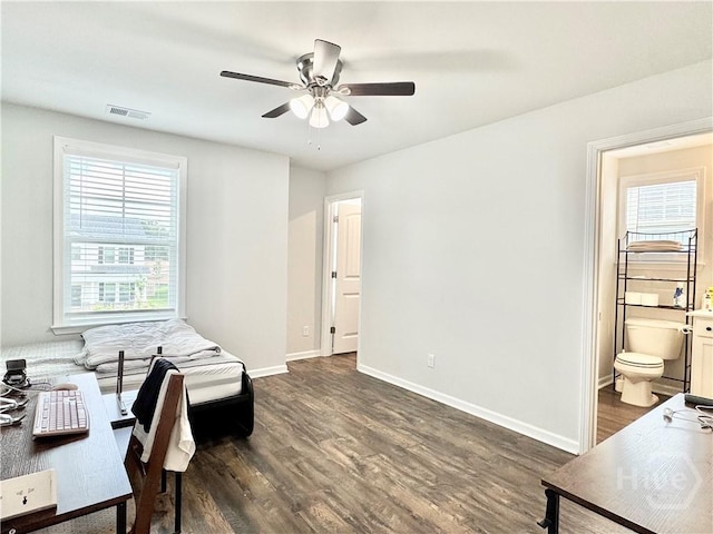 128 Melody Dr, Pooler, GA 31322 - home office featuring dark wood finished floors, ceiling fan, and baseboards