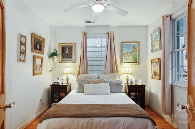 539 E Gwinnett St, Savannah, GA 31401 - bedroom featuring light wood-style flooring, baseboards, and ceiling fan