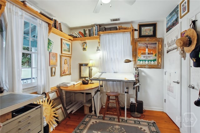 539 E Gwinnett St, Savannah, GA 31401 - office area with wood finished floors, ceiling fan, and baseboards