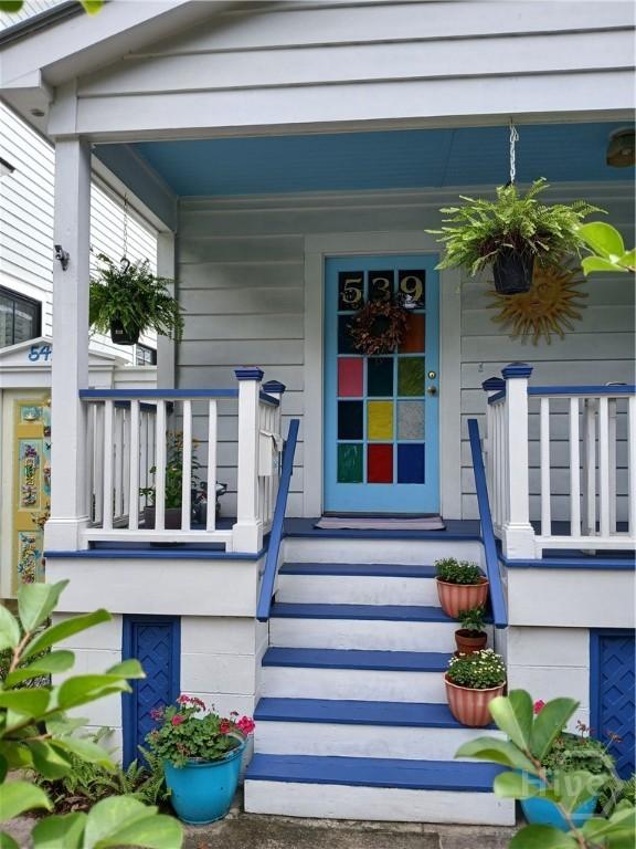 539 E Gwinnett St, Savannah, GA 31401 - doorway to property featuring covered porch