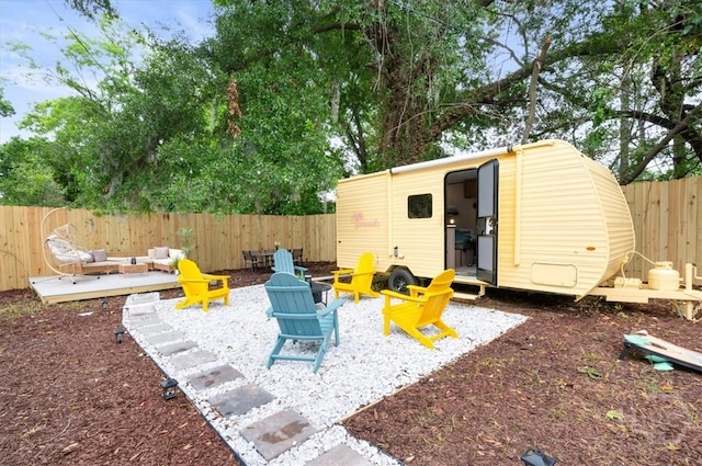 1706 E 31st St, Savannah, GA 31404 - fenced backyard featuring an outdoor fire pit