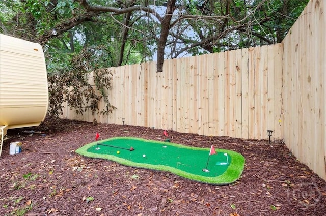 1706 E 31st St, Savannah, GA 31404 - fenced backyard featuring an area to practice putting