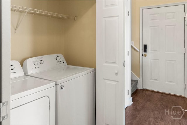 12300 Apache Ave Unit 507, Savannah, GA 31419 - washroom with washer and clothes dryer and dark wood-style flooring