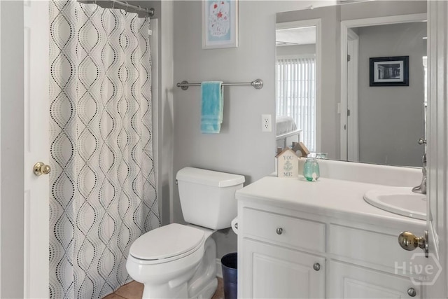 12300 Apache Ave Unit 507, Savannah, GA 31419 - bathroom featuring vanity, toilet, and a shower with shower curtain