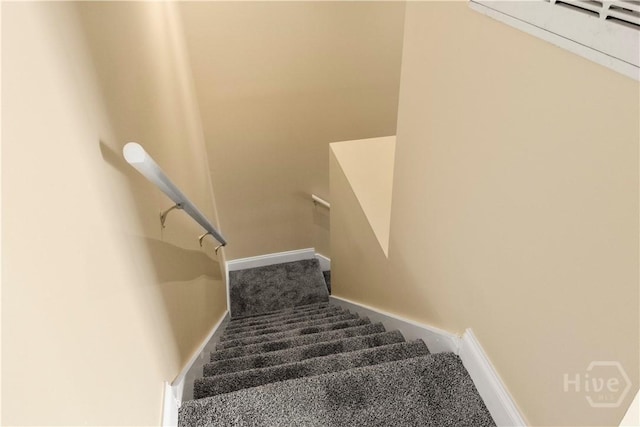 12300 Apache Ave Unit 507, Savannah, GA 31419 - stairway featuring carpet flooring and baseboards