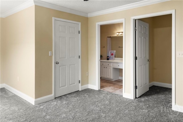 12300 Apache Ave Unit 507, Savannah, GA 31419 - unfurnished bedroom featuring carpet floors, ornamental molding, baseboards, and ensuite bath
