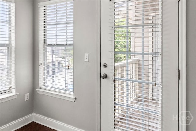 12300 Apache Ave Unit 507, Savannah, GA 31419 - doorway to outside featuring plenty of natural light and baseboards