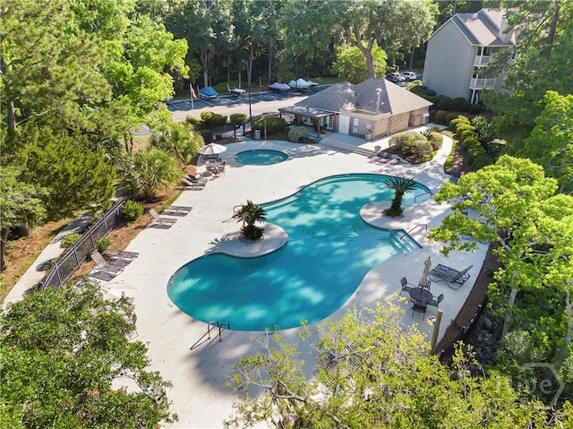 12300 Apache Ave Unit 507, Savannah, GA 31419 - view from above of property with a pool area and a tree filled landscape