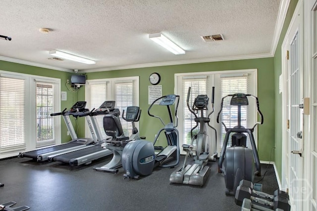 12300 Apache Ave Unit 507, Savannah, GA 31419 - gym featuring a textured ceiling, healthy amount of natural light, french doors, crown molding, and baseboards