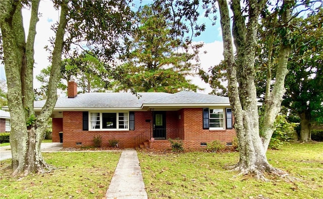 5524 Reynolds St, Savannah, GA 31405 - ranch-style home with crawl space, brick siding, a front lawn, a chimney, and driveway