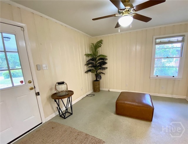 5524 Reynolds St, Savannah, GA 31405 - entryway with plenty of natural light, baseboards, ceiling fan, crown molding, and carpet floors