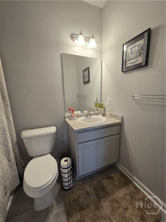 269 Brightleaf Cir, Hinesville, GA 31313 - bathroom featuring vanity, toilet, and tile patterned flooring
