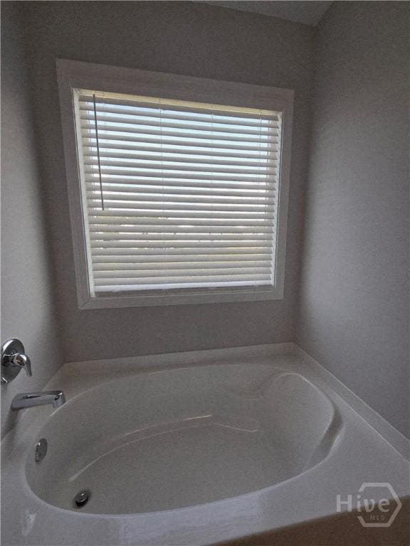 269 Brightleaf Cir, Hinesville, GA 31313 - full bathroom with plenty of natural light and a garden tub