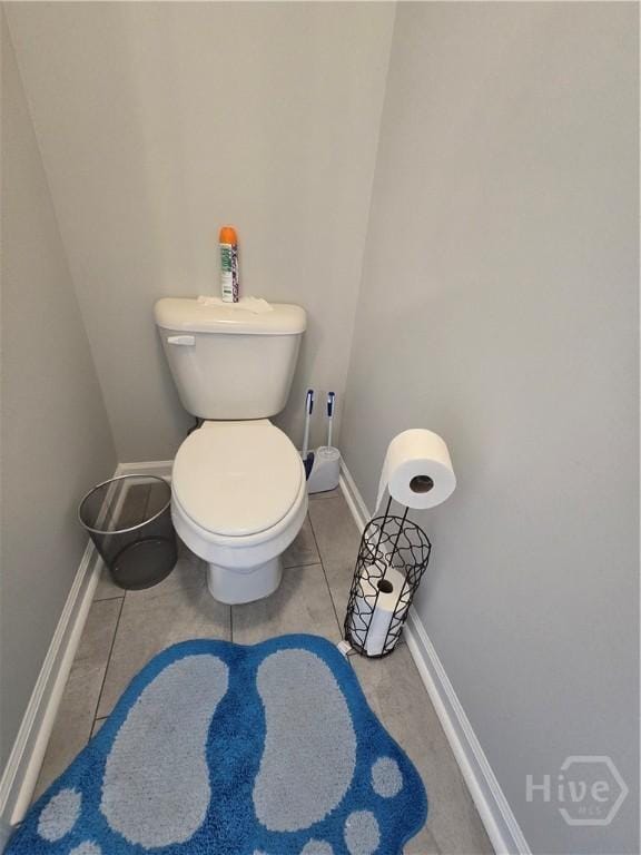 269 Brightleaf Cir, Hinesville, GA 31313 - bathroom with toilet, baseboards, and tile patterned flooring