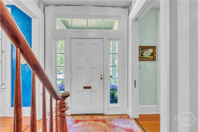 905 Goebel Ave, Savannah, GA 31404 - foyer featuring plenty of natural light, wood finished floors, baseboards, and stairs