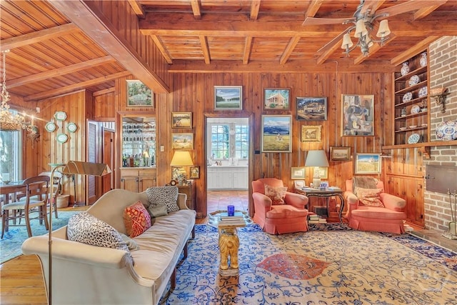 905 Goebel Ave, Savannah, GA 31404 - living room featuring wood ceiling with exposed beams, wooden walls, wood finished floors, and a ceiling fan