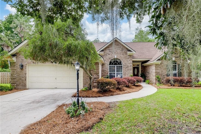 24 Mary Musgrove Dr, Savannah, GA 31410 - view of front of house with brick siding, concrete driveway, a garage, and a shingled roof