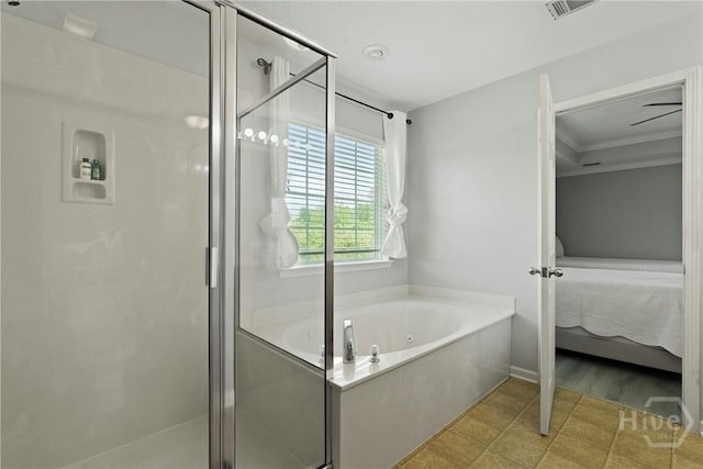 130 Willow Point Cir, Savannah, GA 31407 - bathroom with a tub with jets, connected bathroom, a stall shower, and crown molding