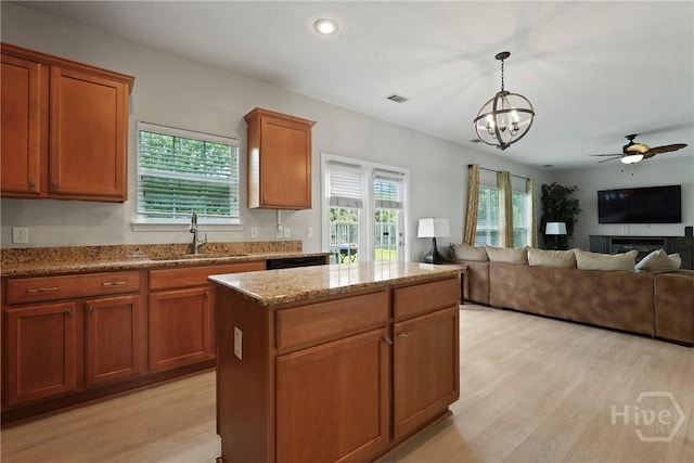 130 Willow Point Cir, Savannah, GA 31407 - kitchen with a sink, light wood-type flooring, a chandelier, open floor plan, and recessed lighting