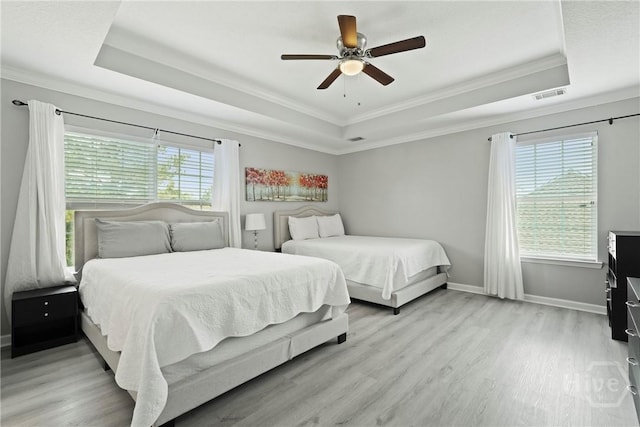 130 Willow Point Cir, Savannah, GA 31407 - bedroom with a tray ceiling, crown molding, light wood finished floors, baseboards, and ceiling fan