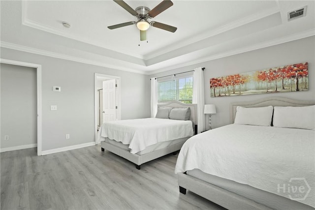 130 Willow Point Cir, Savannah, GA 31407 - bedroom featuring a raised ceiling, light wood finished floors, ornamental molding, baseboards, and a ceiling fan