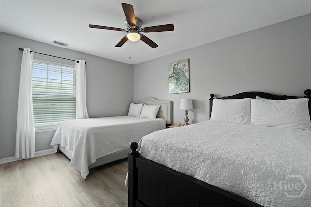 130 Willow Point Cir, Savannah, GA 31407 - bedroom with light wood-type flooring, baseboards, and a ceiling fan