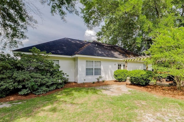 131 Warner Dr, Guyton, GA 31312 - rear view of house featuring a pergola and a yard