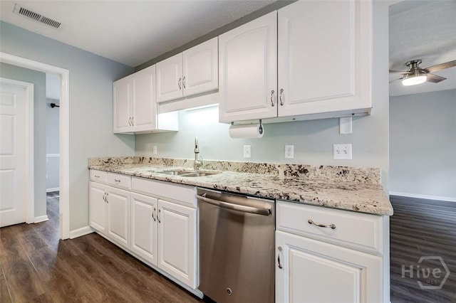 131 Warner Dr, Guyton, GA 31312 - kitchen with dishwasher, a sink, dark wood-style flooring, ceiling fan, and baseboards