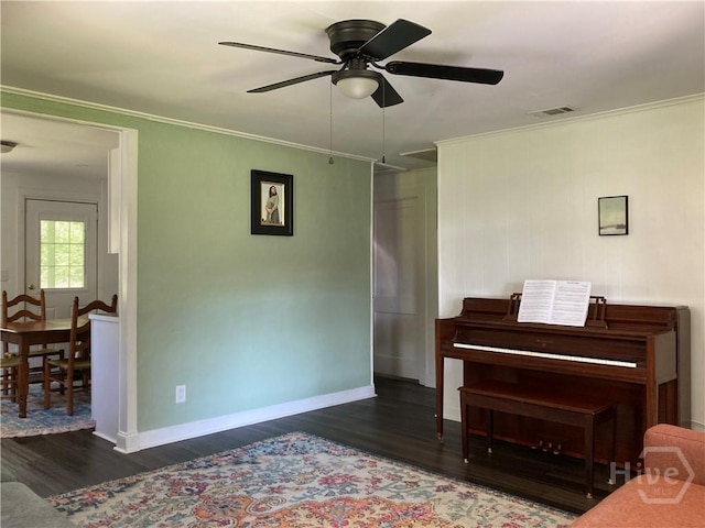155 Oak Hill Rd, Richmond Hill, GA 31324 - sitting room with ceiling fan, wood finished floors, baseboards, and crown molding