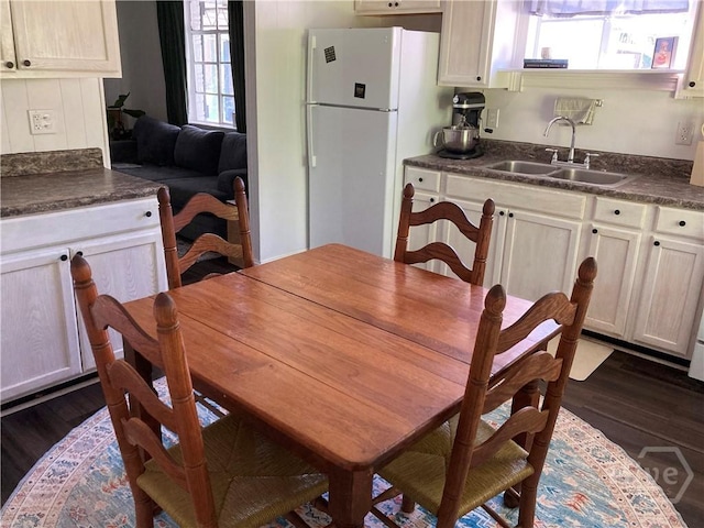 155 Oak Hill Rd, Richmond Hill, GA 31324 - dining space with dark wood-type flooring