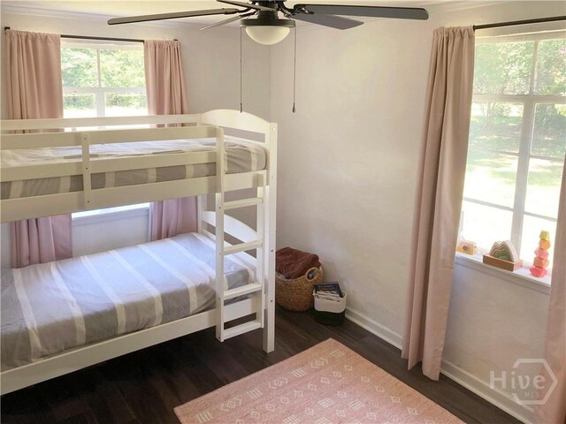 155 Oak Hill Rd, Richmond Hill, GA 31324 - bedroom featuring wood finished floors, baseboards, and ceiling fan