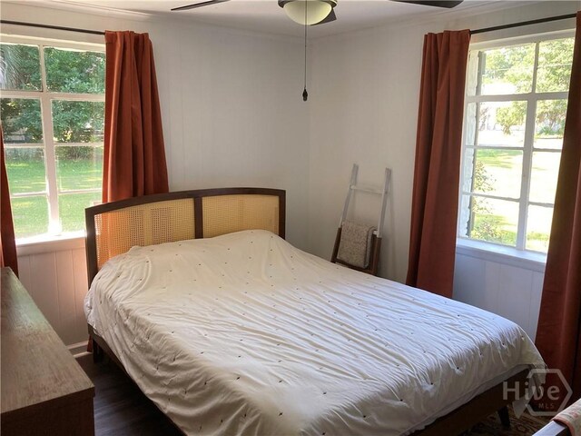 155 Oak Hill Rd, Richmond Hill, GA 31324 - bedroom with dark wood finished floors
