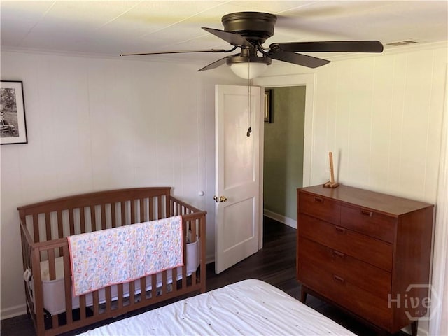 155 Oak Hill Rd, Richmond Hill, GA 31324 - bedroom featuring dark wood-type flooring and a ceiling fan