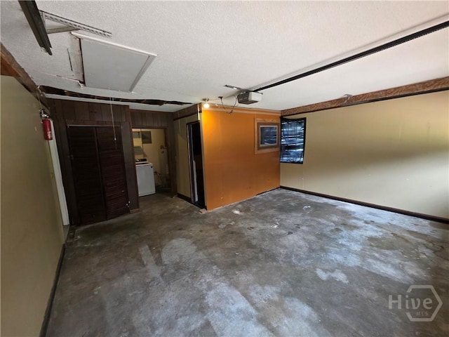 202 Leeds Gate Rd, Savannah, GA 31406 - garage with washer / clothes dryer and baseboards