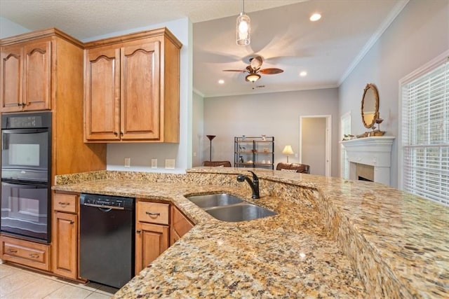 190 Sandpiper Dr, Midway, GA 31320 - kitchen with black appliances, a sink, light stone countertops, a ceiling fan, and recessed lighting