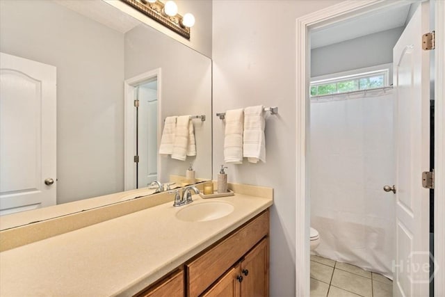 190 Sandpiper Dr, Midway, GA 31320 - full bathroom with toilet, vanity, tile patterned floors, and a shower with curtain