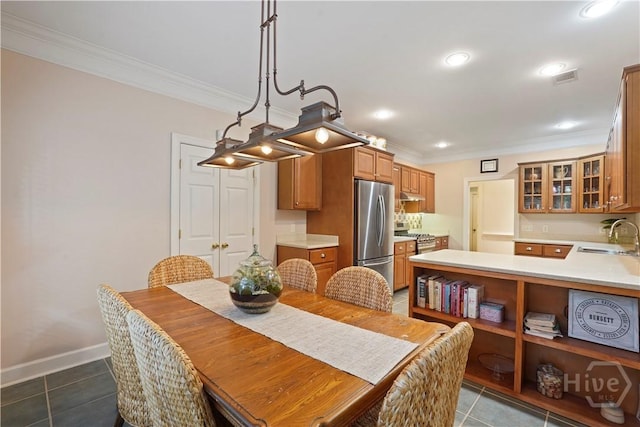 118 Woodline Dr, Savannah, GA 31410 - dining room with ornamental molding, dark tile patterned flooring, recessed lighting, and baseboards