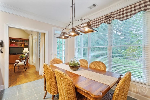 118 Woodline Dr, Savannah, GA 31410 - dining area with ornamental molding and light tile patterned floors