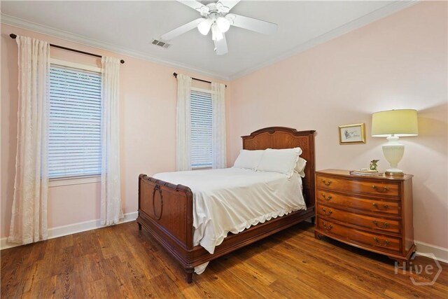 118 Woodline Dr, Savannah, GA 31410 - bedroom with baseboards, wood finished floors, crown molding, and a ceiling fan