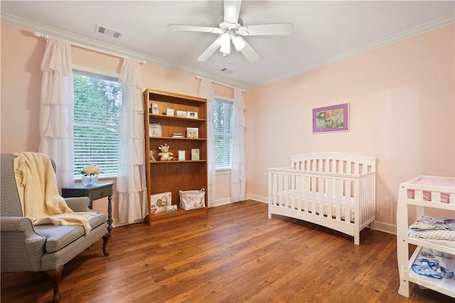 118 Woodline Dr, Savannah, GA 31410 - bedroom with wood finished floors, ornamental molding, baseboards, and a ceiling fan