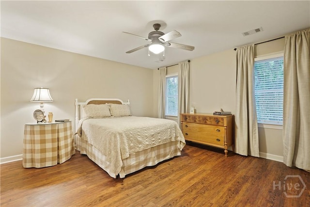 118 Woodline Dr, Savannah, GA 31410 - bedroom featuring multiple windows, wood finished floors, and baseboards