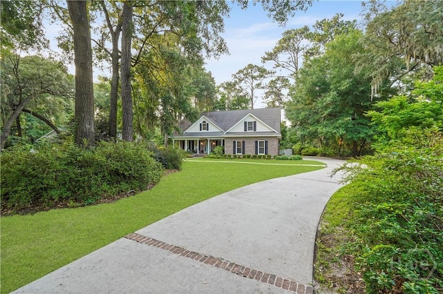 118 Woodline Dr, Savannah, GA 31410 - view of front of home with concrete driveway and a front yard