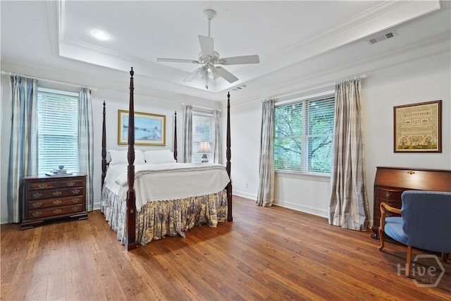 118 Woodline Dr, Savannah, GA 31410 - bedroom featuring a raised ceiling, ornamental molding, hardwood / wood-style floors, baseboards, and a ceiling fan